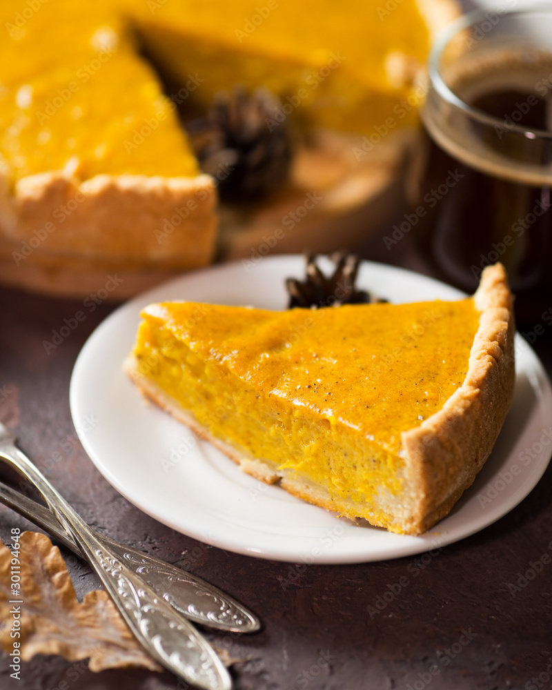 Traditional American thanksgiving pumpkin pie and coffee mug Traditional American thanksgiving pumpkin pie and coffee mug