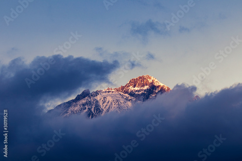 Summit surrounded by clouds, Kazbegi Georgia  © Majid Gheidarlou