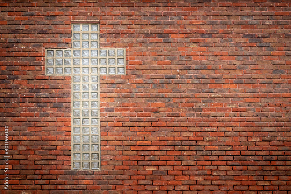 glass cross on church wall