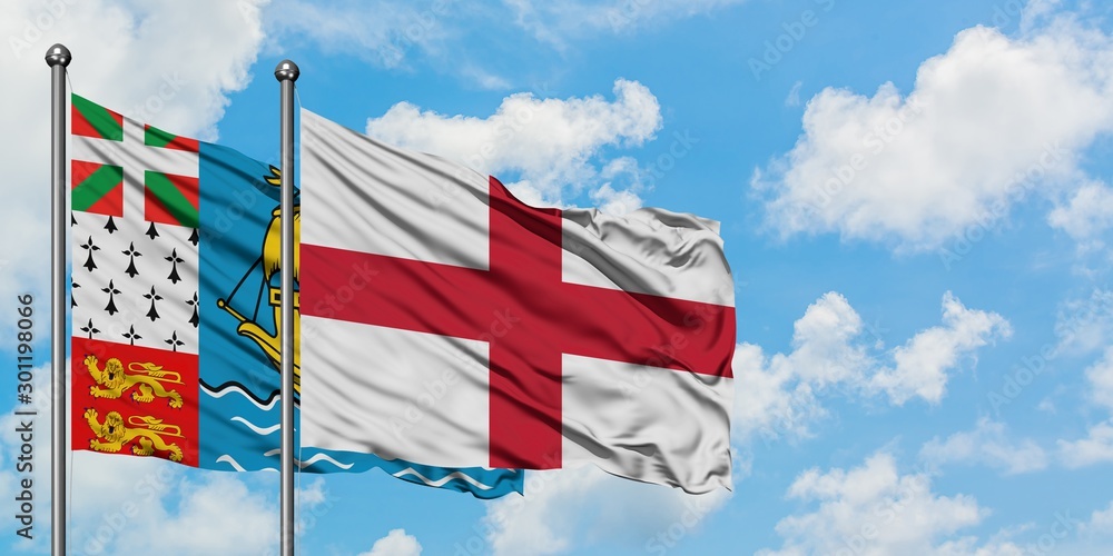 Obraz premium Saint Pierre And Miquelon and England flag waving in the wind against white cloudy blue sky together. Diplomacy concept, international relations.