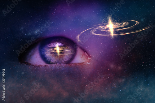 Close up Abstract eye concept looking on a New star circle . Nebula dust in infinite space backgroud. Mixed media. photo