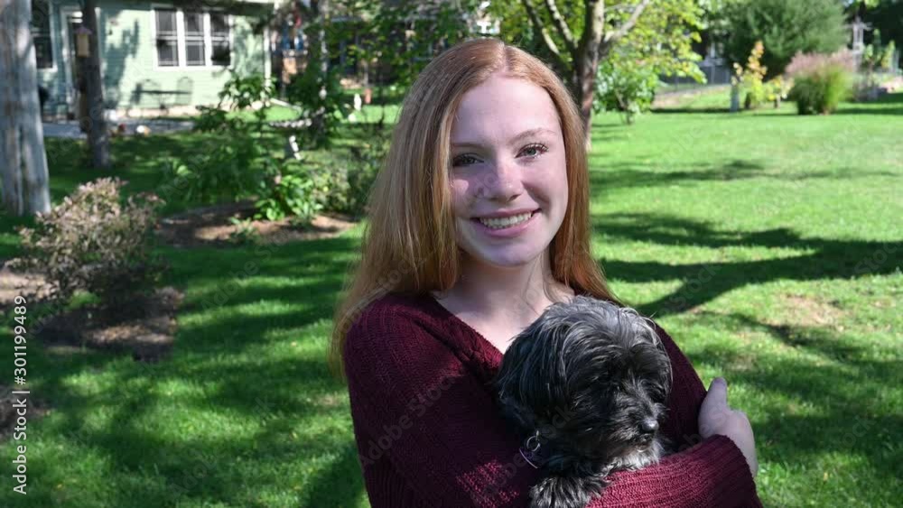 Madelyne loves her dog. Poodle mix Madelyne loves her dog. Poodle mix