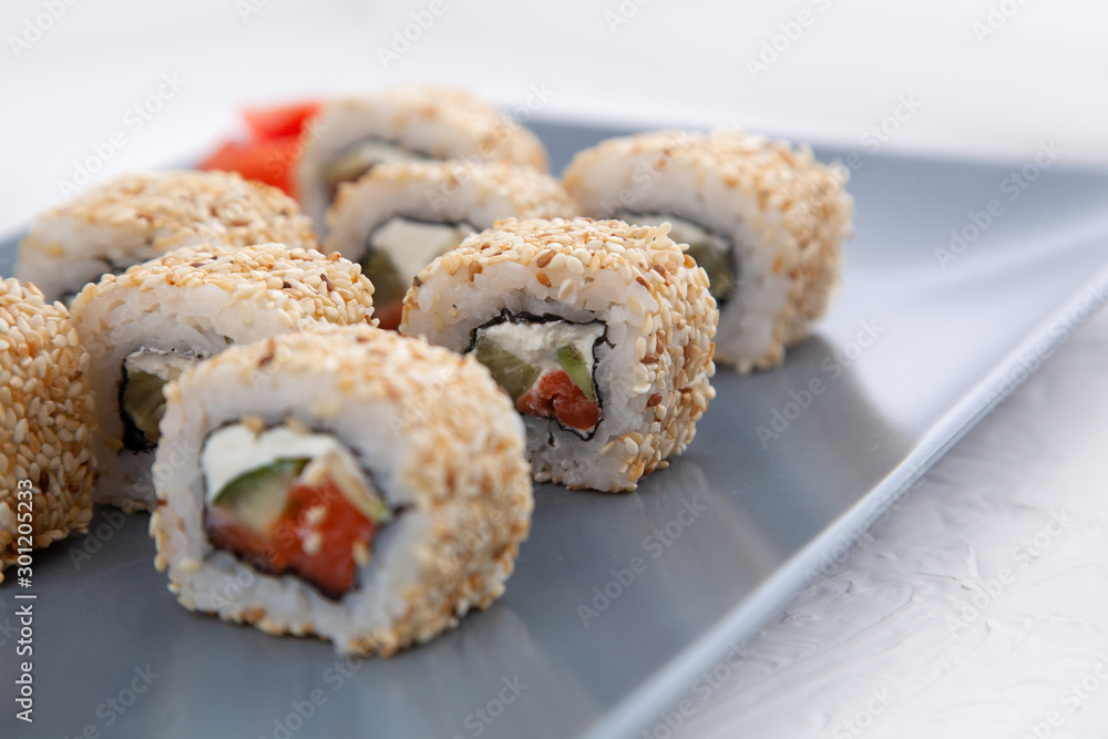 California sushi with sesame. Salmon Rolls California sushi with sesame. Salmon Rolls