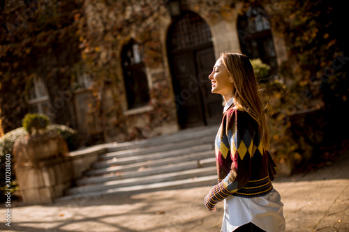 Pretty young woman walking ...