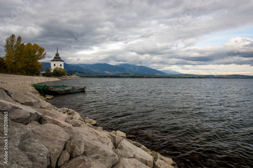 Obraz na płótnie Water reservoir Liptovska Mara in backgroud with High Tatra Mountains w salonie