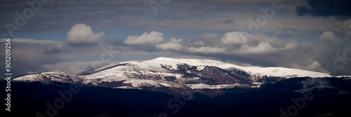 panorama of a snowy mountain peak