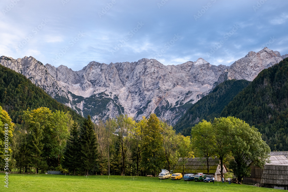 Jezersko valley in the alps of slovenia with camper vans driving around