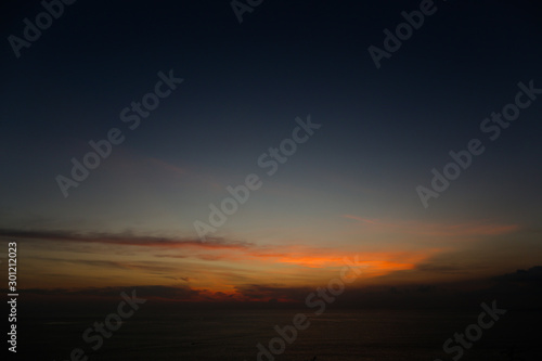 Nice sea landscape and sunset sky with orange clouds. photo