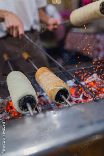 Preparation of the famous, traditional and delicious Hungarian Chimney Cake