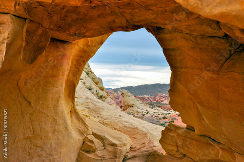 Sandstone desert arch in Valley of Fire State Park, Nevada, USA.