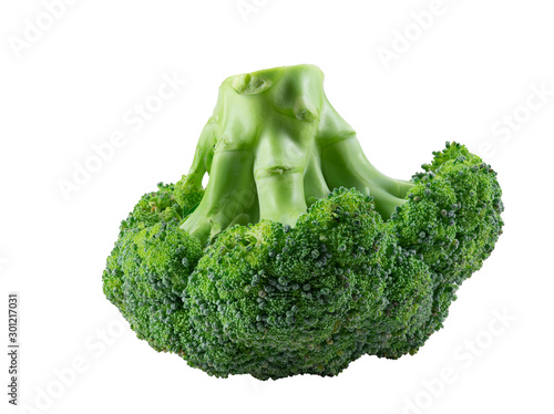 Green broccoli isolated on white background with copy space for text or images. Edible vegetable with large flowering head. Side view. Close-up.