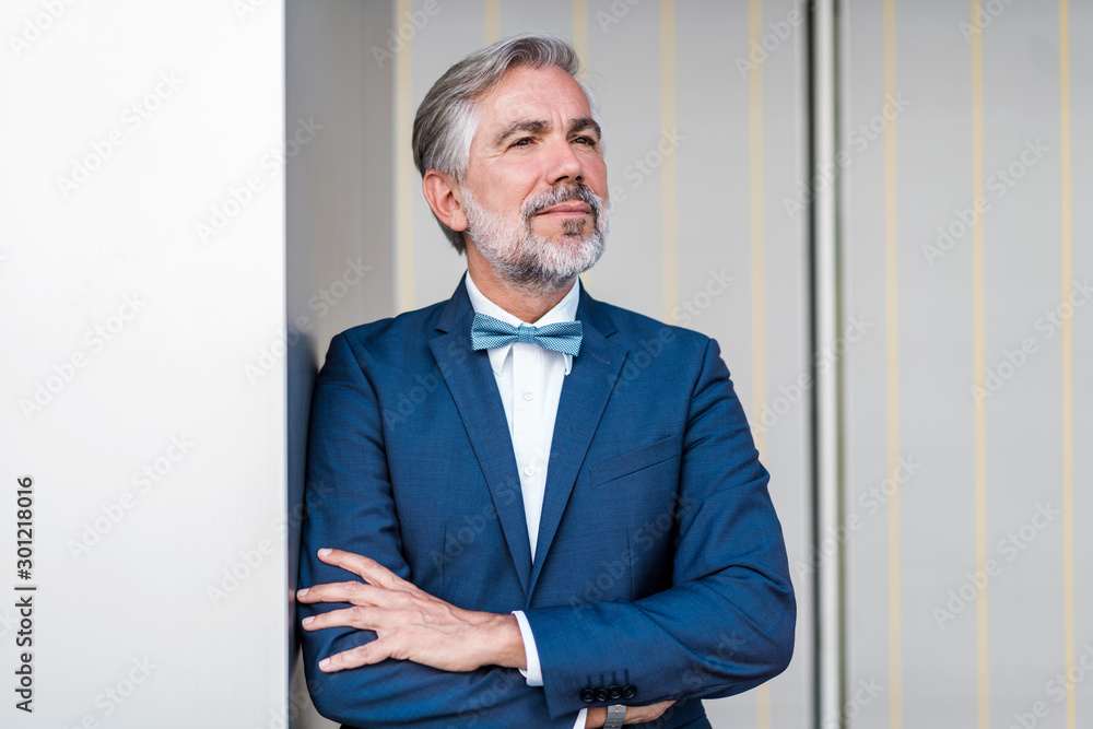 Portrait of elegant mature businessman outdoors Portrait of elegant mature businessman outdoors