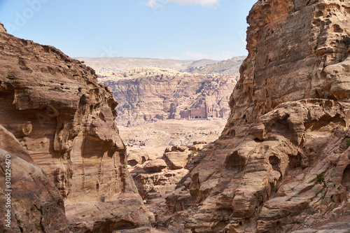 Royal Tombs in ancient city of Petra seen from rocky canyon  Jordan 
