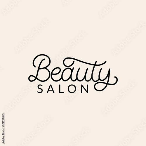 Hand drawn logo. The inscription: Beauty salon. Perfect design for greeting cards, posters, T-shirts, banners, print invitations.