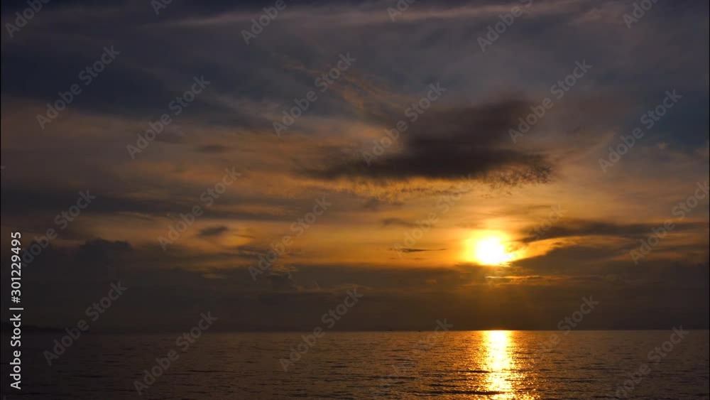 Time lapse sunset with moving clouds above the seascape Time lapse sunset with moving clouds above the seascape