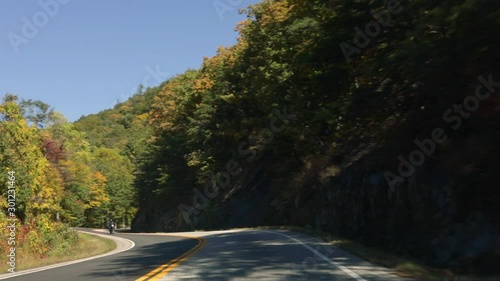 Driving through the curvy roads in the mountains. photo