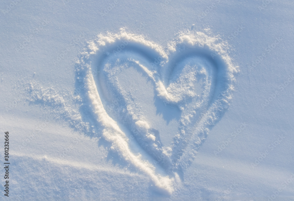 drawn heart on white snow. winter, frost. drawn heart on white snow. winter, frost.