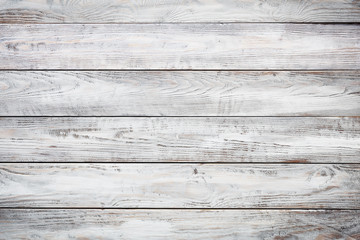 Gray wooden background with old painted boards
