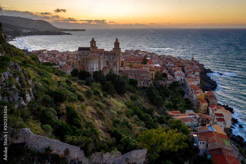 Aerial view evening cityscape of Cefalu town with Chiesa di Cefalu, Sicily, Italy