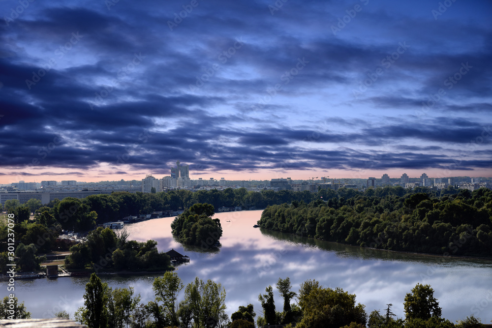 panorama city view while sunset over Belgrade, Serbia at confluence of two main rivers, Danube and Sava