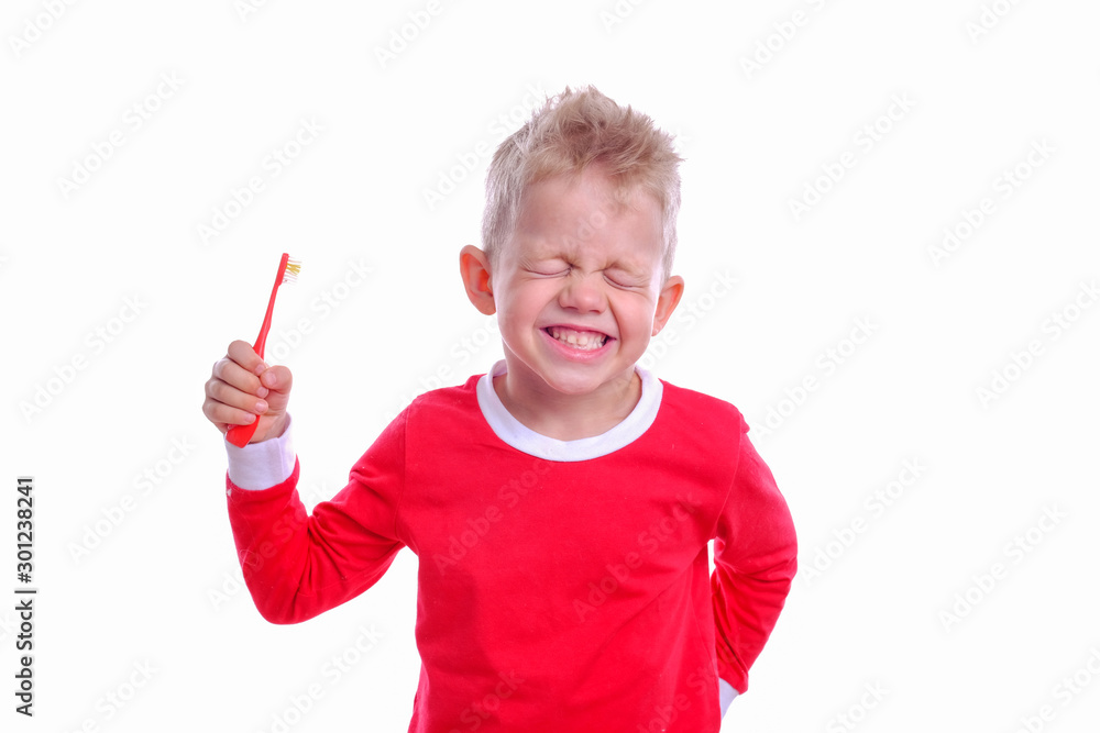 Happy child kid boy brushing teeth on white background. Health care, dental hygiene, people and beauty concept. Mockup, free space. Happy child kid boy brushing teeth on white background. Health care, dental hygiene, people and beauty concept. Mockup, free space.