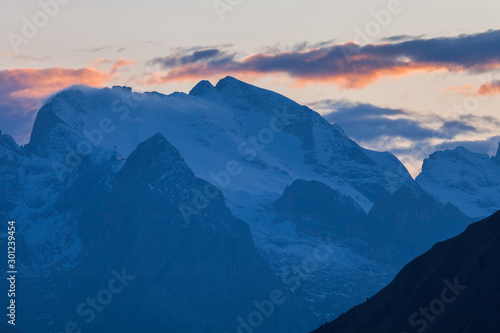 Alpenglow and clouds highlighting Marmolada  Cortina d Ampezzo  Dolomites  Veneto  Italy