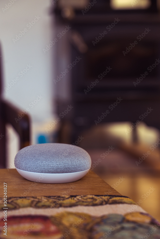 voice controlled smart speaker in a interior home environment. Smart home ai concept voice controlled smart speaker in a interior home environment. Smart home ai concept