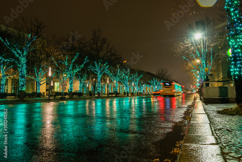 Photography Street in Berlin at Christmas time, rainy weather, wet street, street with Chris