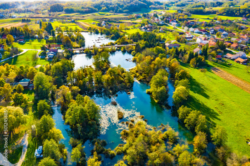 Panoramic view of Mreznica river in autumn from drone, green landscape and waterfalls, Croatia, popular touristic destination