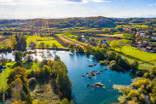 Panoramic view of Mreznica river in autumn from drone, green landscape and waterfalls, Croatia, popular touristic destination