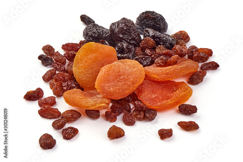 Fotografie Mixed dried fruits, isolated on white background