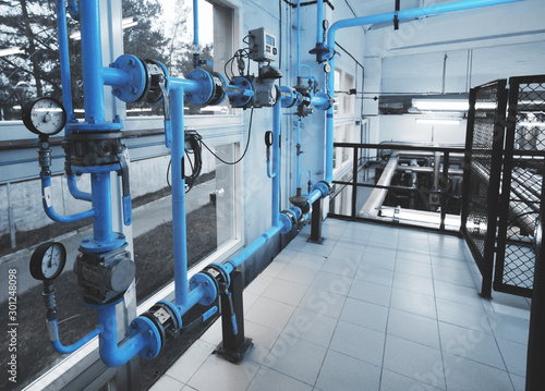  gas pipline with pressure metters installed in modern industrial boiler room photo