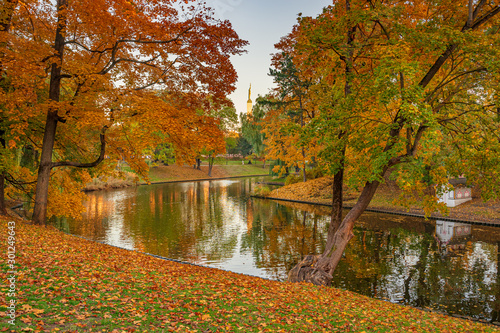 Beautiful autumn colors in the park with river. Riga, Latvia © MKozloff