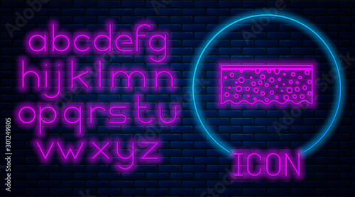Glowing neon Sponge with bubbles icon isolated on brick wall background. Wisp of bast for washing dishes. Cleaning service logo. Neon light alphabet. Vector Illustration