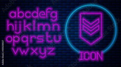 Glowing neon Chevron icon isolated on brick wall background. Military badge sign. Neon light alphabet. Vector Illustration