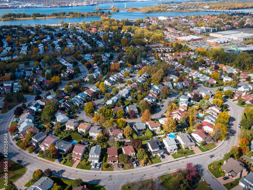 Montreal, Quebec, Canada, Aerial View of Family Homes in Residential Neighbourhood During Fall Season photo