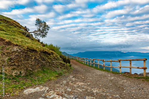 Road on the mountain road near the Camaggiore mountain village above the lake Como in the early morning  Italy