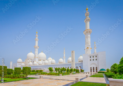 View of famous Abu Dhabi Sheikh Zayed Mosque by night, UAE. photo