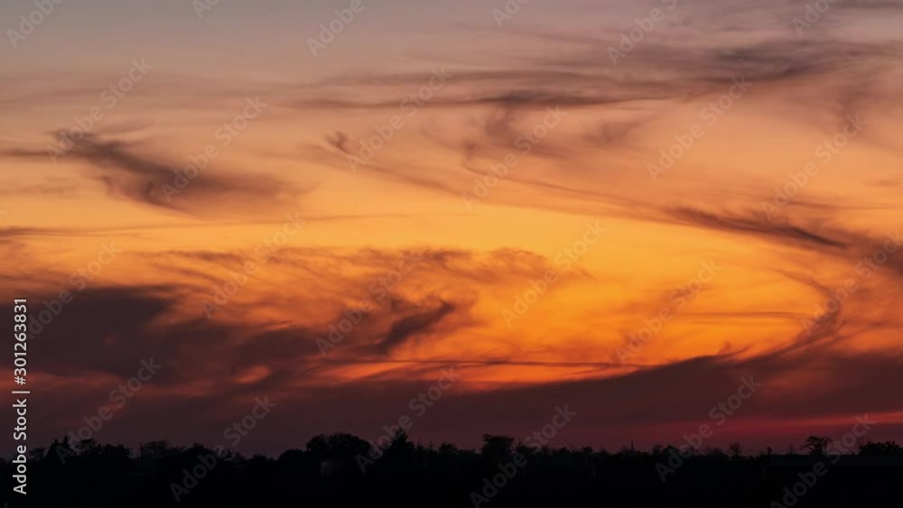 Time Lapse Sunset with Blur Moving Clouds Time Lapse Sunset with Blur Moving Clouds