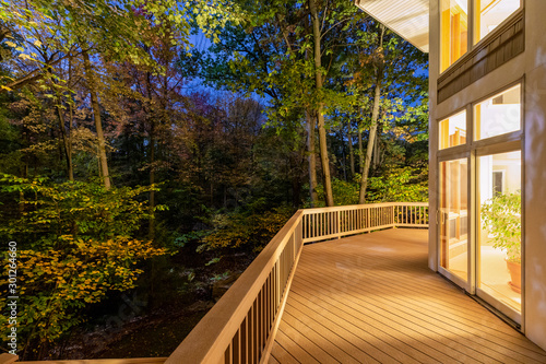 Deck on Home in Woods at Night