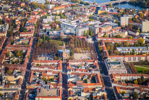 Potsdam Downtown  Germany   with the  Bassinplatz    St. Peter and Paul cathedral and hospital  Ernst von Bergmann  during early autumn - aerial view