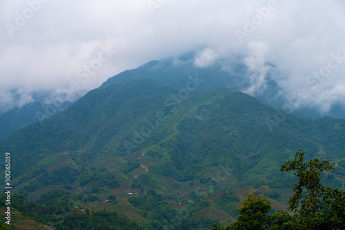 Beautiful landscape images of Sapa and the surrounding mountains with their peaks poking out of clouds
