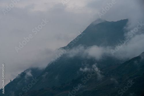 Beautiful landscape images of Sapa and the surrounding mountains with their peaks poking out of clouds