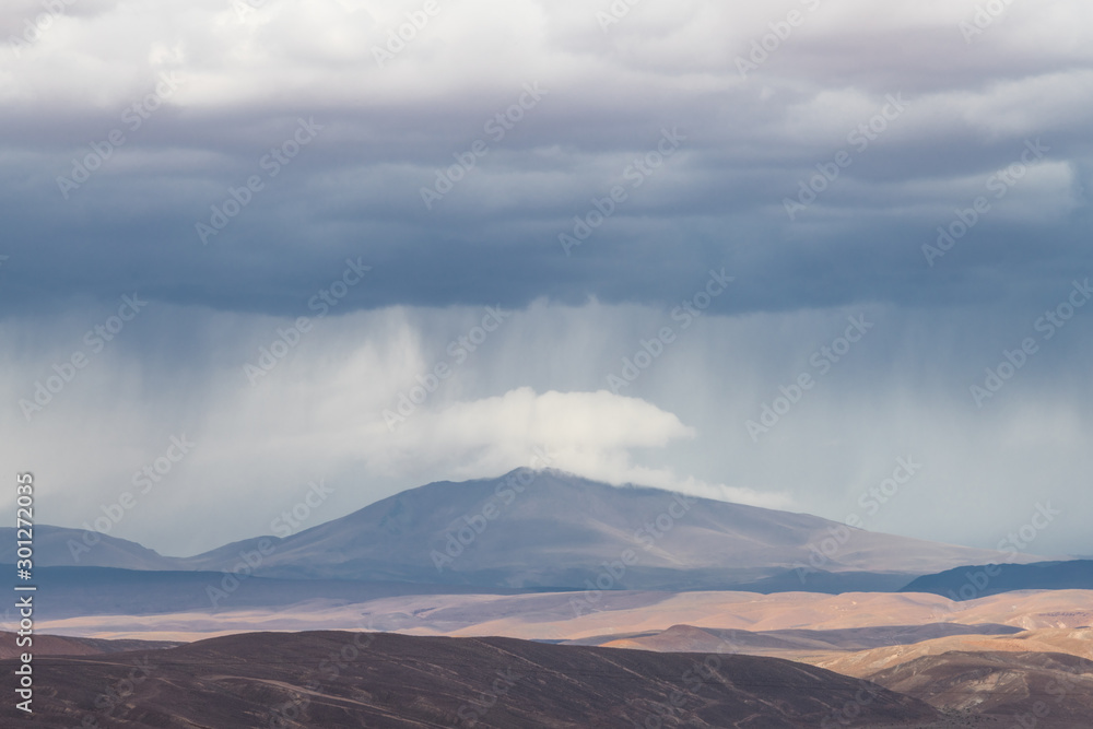 Fototapeta premium Flash Rainstorm in the Andes at San Pedro de Atacama