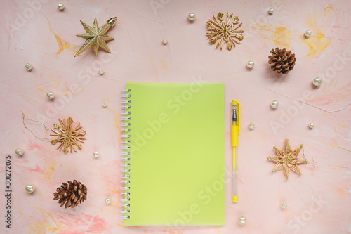 Notepad and pen on a desk workspace, winter template photo