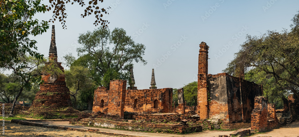 Beautiful ruins of Wat Phra Si Sanphet Temple, which is on the site of the old Royal Palace of ancient capital of Ayutthaya, Thailand. Panoramic view Beautiful ruins of Wat Phra Si Sanphet Temple, which is on the site of the old Royal Palace of ancient capital of Ayutthaya, Thailand. Panoramic view