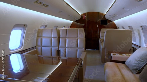 Modern private business jet leather seats and interior