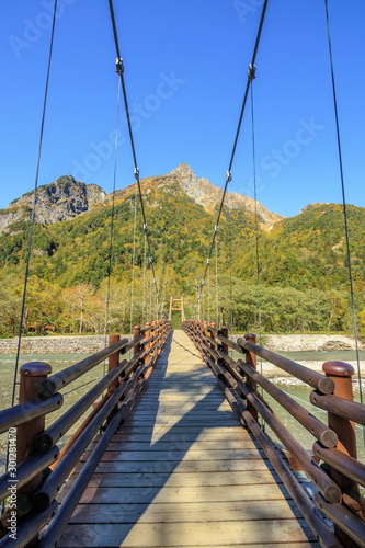 秋の上高地 穂高連峰と明神橋 長野県松本市 Kamikochi in autumn Hotaka mountain range and Myojin Bridge Nagano Matsumoto city