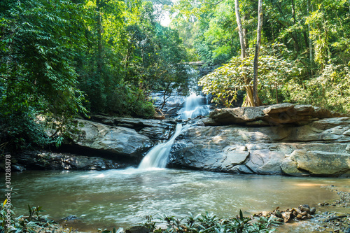 Fototapeta Naklejka Na Ścianę i Meble -  Tat Mok waterfall in Chinag Mai, Thailand. Tatmok or Tard mok waterfall at Mae Rim District in Northern Thailand.