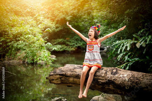 Hill tribe children are happy in the midst of nature. Children in the forest.